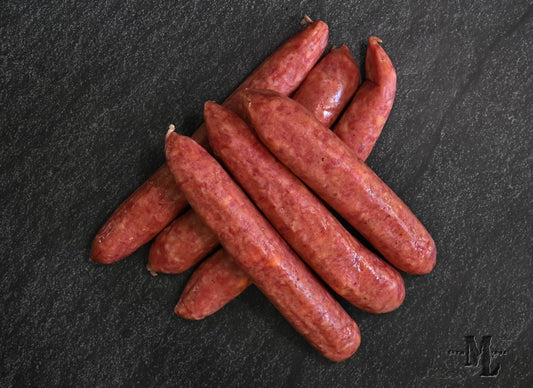 Salchichas con queso cheddar del viejo oeste
